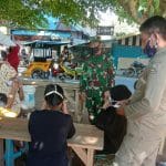 Pembagian Masker Kembali Dilakukan di Kota Bobong