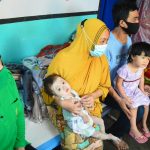 Selesai Operasi Down Syndrom, Istri Tentara dan Swiss Bell Beri Bantuan Afiq